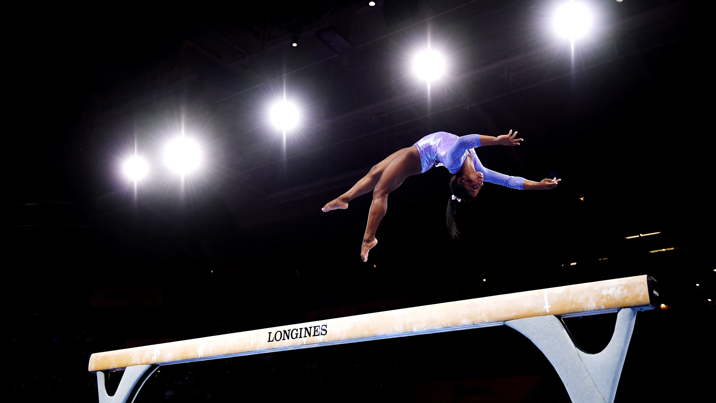 Simone Biles on the beam. Photo Courtesy: The Olympics
