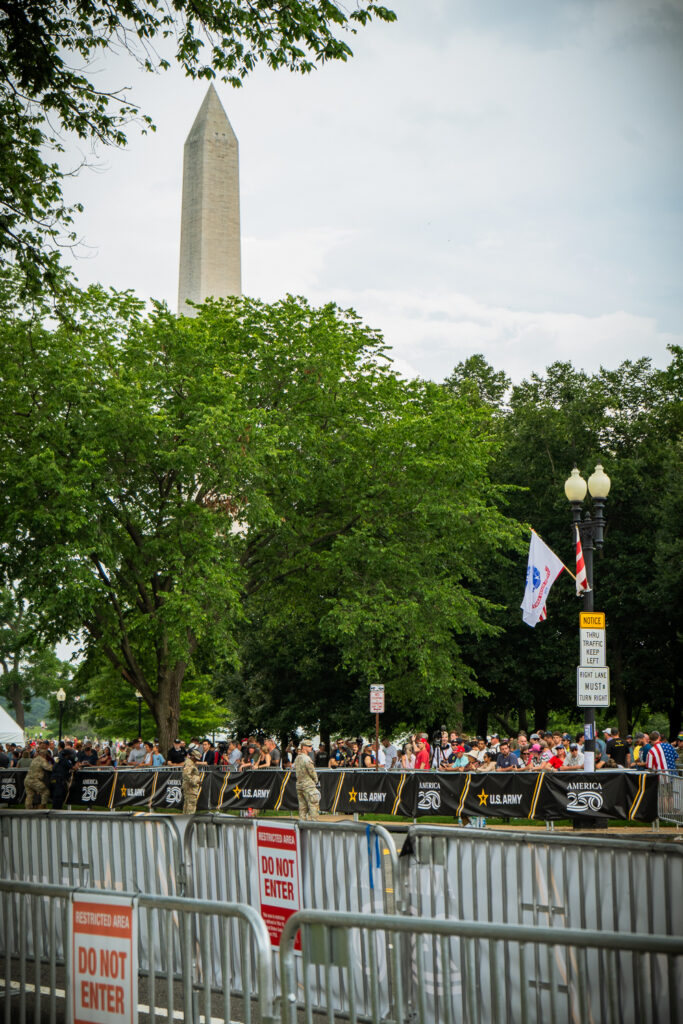 Attendees line up on the National Mall to watch the Army parade Saturday, June 14. Photo by Hannah Parcells.