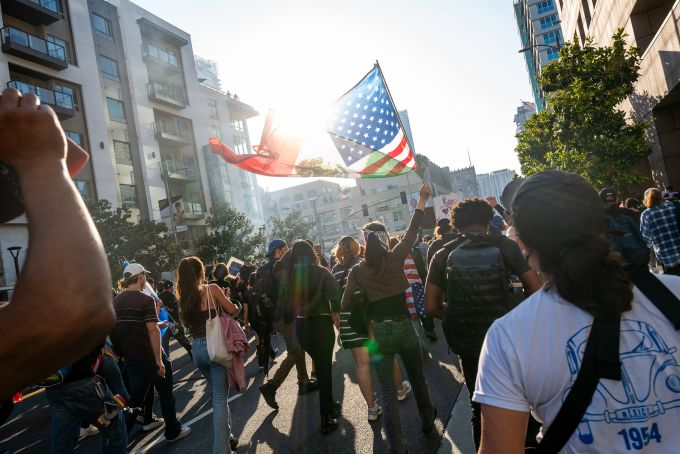 Protesters move through downtown Los Angeles on Tuesday. Spencer Platt/Getty Images