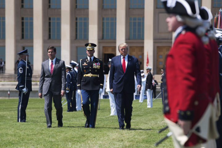 President Donald J. Trump walks with Defense Secretary Dr. Mark T. Esper during a welcome ceremony in Esper's honor at the Pentagon, July 25, 2019. Army Sgt. Amber Smith, DOD.