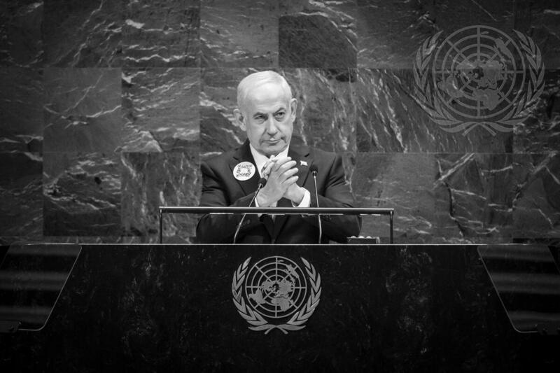 enjamin Netanyahu (at podium and on screen), Prime Minister of the State of Israel, addresses the general debate of the General Assembly's eightieth session -Source UN