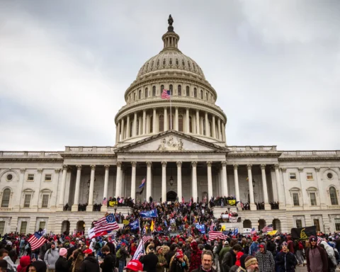 Supporters of Donald Trump during an attack on the U.S. Capitol, Washington, D.C., January 6, 2021. Jon Cherry/Getty Images News