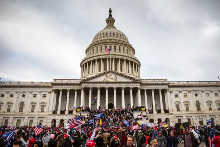 Supporters of Donald Trump during an attack on the U.S. Capitol, Washington, D.C., January 6, 2021. Jon Cherry/Getty Images News